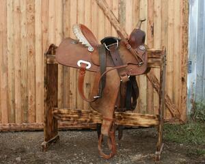 burnt free standing saddle stand