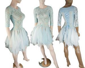 The skirt has lots of soft white organza type fabric and baby blue fabric as the tatters. The top is stretchy and transparent. It also has ties in the back to allow for flexibility in size and shape. The skirt is around knee length on a 5" lady longer on a younger girl.