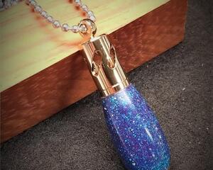 Aromatherapy Necklace in 24kt Gold made with diamond infused resin.