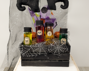 Potion crate with witch feet sticking out