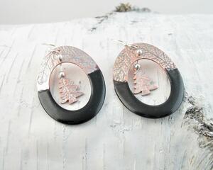 Black copper enamel hoop earrings with dangling tree inside hoop