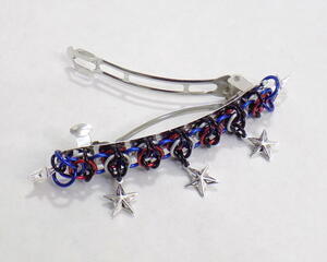 Patriotic themed red, white, and blue chainmaille with silver stars on a 3 inch steel barrette bas, handmade in USA by RainbowMaille