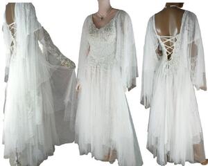 White sparkly wedding dress. Lace-up back and lots of sparkles.