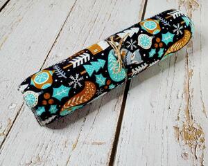 side view of christmas squirrel print non-paper towels.