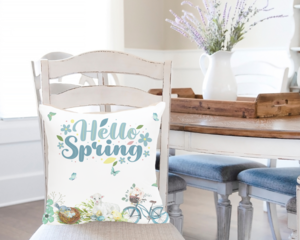 Blue hello spring pillow on dining chair