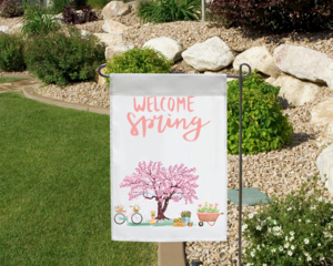 Welcome spring garden flag in landscape setting