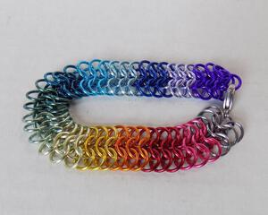 Handmade rainbow pride chainmaille bracelet in European 6 in 1 pattern of anodized aluminum by RainbowMaille in the USA