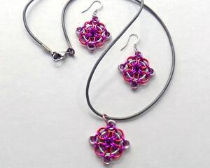 Matching chainmaille earrings and necklace in pink and silver, handmade by RainbowMaille in the USA