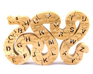 Hand-cut Alphabet Snake Puzzle made from premium hardwood, finished with mineral oil and beeswax for durability. Each of the 26 pieces represents a letter, promoting alphabet learning and essential skills development in kids through play.