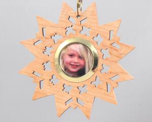 Handmade Wood Photo Ornament: A personalized holiday decoration crafted from maple wood, featuring a hand-cut design and a customizable photo insert. Perfect for adding a personal touch to your Christmas tree or holiday décor. A unique and thoughtful gift that will become a cherished keepsake for years to come.