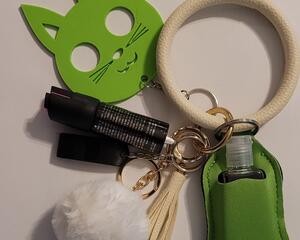 Green cat safety keychain with accessories