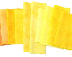 Shades of yellow scrap bundle of hand dyed quilting cotton