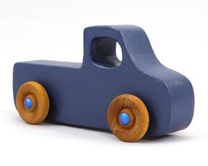 Handmade wooden toy little pickup truck painted military blue with metallic sapphire blue trim and nonmarring amber shellac wheels.