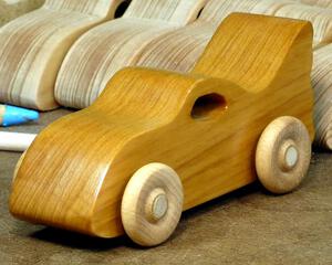 Handmade wooden toy bat car handcrafted and finished with amber shellac. This car is a part of my Play Pal Collection.
