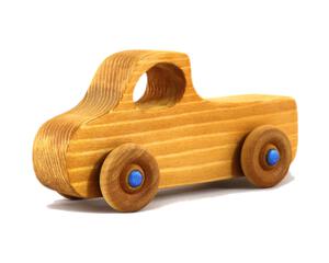 A handmade wooden pickup truck from the Play Pal Collection with an amber shellac finish and metallic sapphire blue acrylic paint.