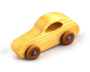 Handmade wooden toy car modeled after the classic 1957 Bug with an amber shellac finish and metallic sapphire blue trim from My Play Pal Collection.