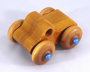 Handmade Wooden Toy Monster Pickup Truck with large wheels Made From Laminated Hardwoods and Finished With Amber Shellac and metallic Sapphire Blue From My Play Pal Collection