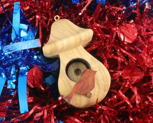 Handmade Wood Birdhouse Ornament Collectable Christmas Tree Ornament shapeed like a Christmas tree. Made from select-grade hardwoods, hand-sanded, and finished with a custom blend of oils and waxes using traditional woodworking tools.