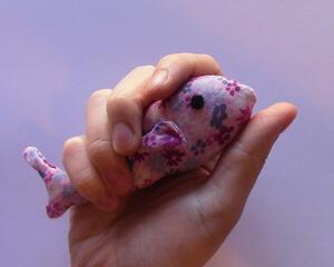 hand sewn pocket sized pink flower patterned stuffed fish