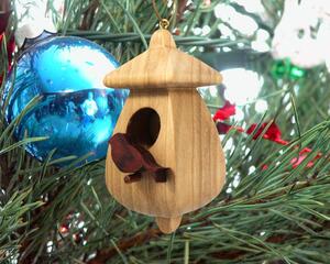Handmade Wood Birdhouse Ornament Collectable Christmas Tree Ornament shapeed like a Christmas tree. Made from select-grade hardwoods, hand-sanded, and finished with a custom blend of oils and waxes using traditional woodworking tools.