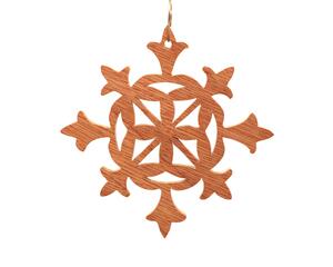 Handmade snowflake-style fretwork Christmas tree ornament crafted from reclaimed wood, meticulously finished with clear shellac for a rustic and festive touch.