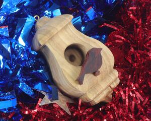 Handmade Wood Birdhouse Ornament Collectable Christmas Tree Ornament shapeed like a Christmas tree. Made from select-grade hardwoods, hand-sanded, and finished with a custom blend of oils and waxes using traditional woodworking tools.