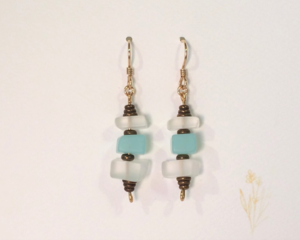 Aqua blue and white tumbled glass earrings with the look of sea glass featuring brass accents and durable 14 K gold filled ear wires