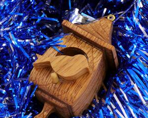 Handmade Wood Birdhouse Ornament Collectable Christmas Tree Ornament shapeed like a Christmas tree. Made from select-grade hardwoods, hand-sanded, and finished with a custom blend of oils and waxes using traditional woodworking tools.