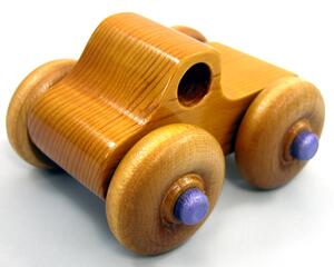Handmade wood toy monster pickup truck from the Play Pal Collection, featuring a stunning finish of amber shellac and metallic purple trim. Crafted in the USA using traditional woodworking tools and techniques, this eye-catching toy truck is built to last.


Carefully assembled and tested for the highest quality, it's designed for kids to play with. The large wheels ensure smooth rolling on various surfaces, and its sturdy build can withstand rough play, making it a durable and enjoyable addition to any child's collection.
