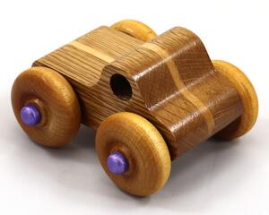 This handmade wood toy truck is a unique and durable addition to any child's playroom. Made from three laminations of oak and poplar hardwoods and finished with satin polyurethane, amber shellac, and metallic purple paint. This toy pickup truck will withstand rough-and-tumble play. With a focus on quality, each toy is carefully assembled and tested, with only the highest quality materials used in the construction process.