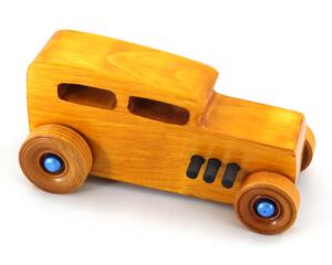 Handcrafted wooden hot rod toy car modeled after a classic '32 sedan. Finished with amber shellac and adorned with metallic sapphire blue and black trim. This unique piece is part of my Hot Rod Collection.