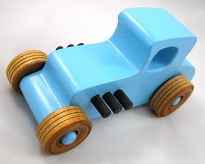 Handmade wooden toy car modeled after a '27 T-Coupe, finished with baby blue and black acrylic paint with nonmarring amber shellac wheels from my hot rod collection.