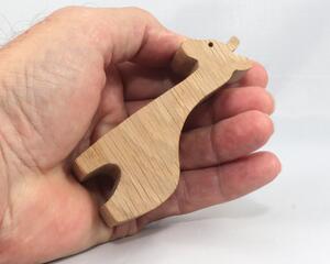 Handmade wooden giraffe cutout, unfinished, ready to paint, and freestanding. Perfect for a young child's imaginative play, stacking, or crafting.