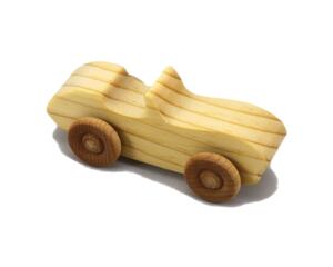 A small handmade wooden toy car hand-finished with a custom blend of mineral oil and waxes.