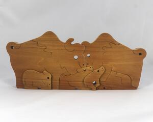 Handmade freestanding buffalo family stacking puzzle made of select-grade hardwoods. Finished with a blend of mineral oil, beeswax, and carnauba wax.