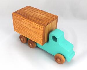 This handmade wooden toy truck is a box truck or moving van, painted in your choice of several colors. The wheels and body of the truck are finished with shellac.