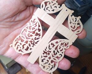 This handmade Christian cross features a Victorian-style fretwork design, making it a perfect ornament for Easter, Christmas, or home decor.