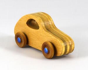 A handmade wooden toy car is hand-finished with amber shellac with metallic sapphire blue acrylic paint trim. The car body is made from hardwood plywood. The wheels and axles are made from birch hardwood. It is part of my Play Pal Collection.