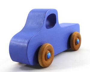 Handmade wood toy truck painted blue with metallic sapphire blue trim and nonmarking amber shellac wheels from my Play Pal Collection.