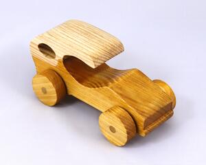 Handmade wooden toy car finished with nontoxic clear, amber shellac and contrasting wood trim. It's one of ten cars in my Speedy Wheels Collection.