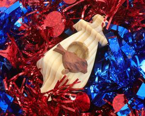 Handmade Wood Miniature Birdhouse Ornament crafted using only the finest select hardwoods and traditional woodworking tools. Each ornament is individually finished with a blend of mineral oil and beeswax to bring out the natural beauty of the wood.