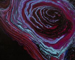 Blue and Red rings flow gently and the center almost looks like a black rose is emerging. Take a closer look and decide what you see.