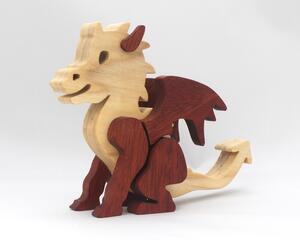 Hand-crafted baby dragon mythical fantasy animal figurine made from contrasting high-quality hardwoods and finished with non-toxic oils and waxes. Perfect for any dragon enthusiast.