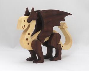 Handmade wood dragon figurine made from premium contrasting color hardwoods and hand finished with a custom blend of oils and waxes applied hot for deep penetration durability, the perfect gift for any dragon lover.