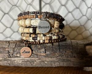 Boho wood bead bracelet with statement charms, it’s pretty and eye-catching bracelet to wear. It wraps around your wrist about nine times.