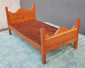 A cherry doll bed for 18" dolls.