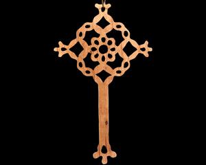 A beautiful handmade wood fretwork Christmas tree ornament in a classic Victorian icicle style. This delicate ornament is hand finished with clear shellac for a timeless look. It is the perfect addition to any Christmas tree collection.