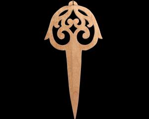 A beautiful handmade wood fretwork Christmas tree ornament in a classic Victorian icicle style. This delicate ornament is hand finished with clear shellac for a timeless look. It is the perfect addition to any Christmas tree collection.