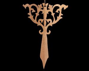 A beautiful handmade wood fretwork Christmas tree ornament in a classic Victorian icicle style. This delicate ornament is hand finished with clear shellac for a timeless look. It is the perfect addition to any Christmas tree collection.