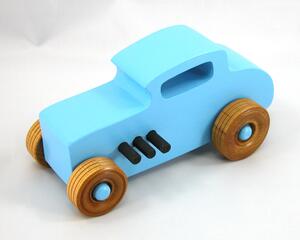 A wooden handmade hot rod toy car modeled after a 32 Deuce Coupe, painted in baby blue and black acrylic paint, with non-marring Amber Shellac wheels.